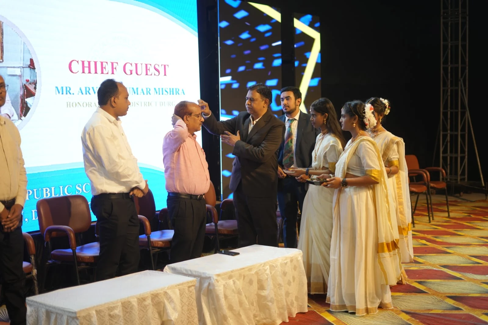 Students and school leadership during an award ceremony